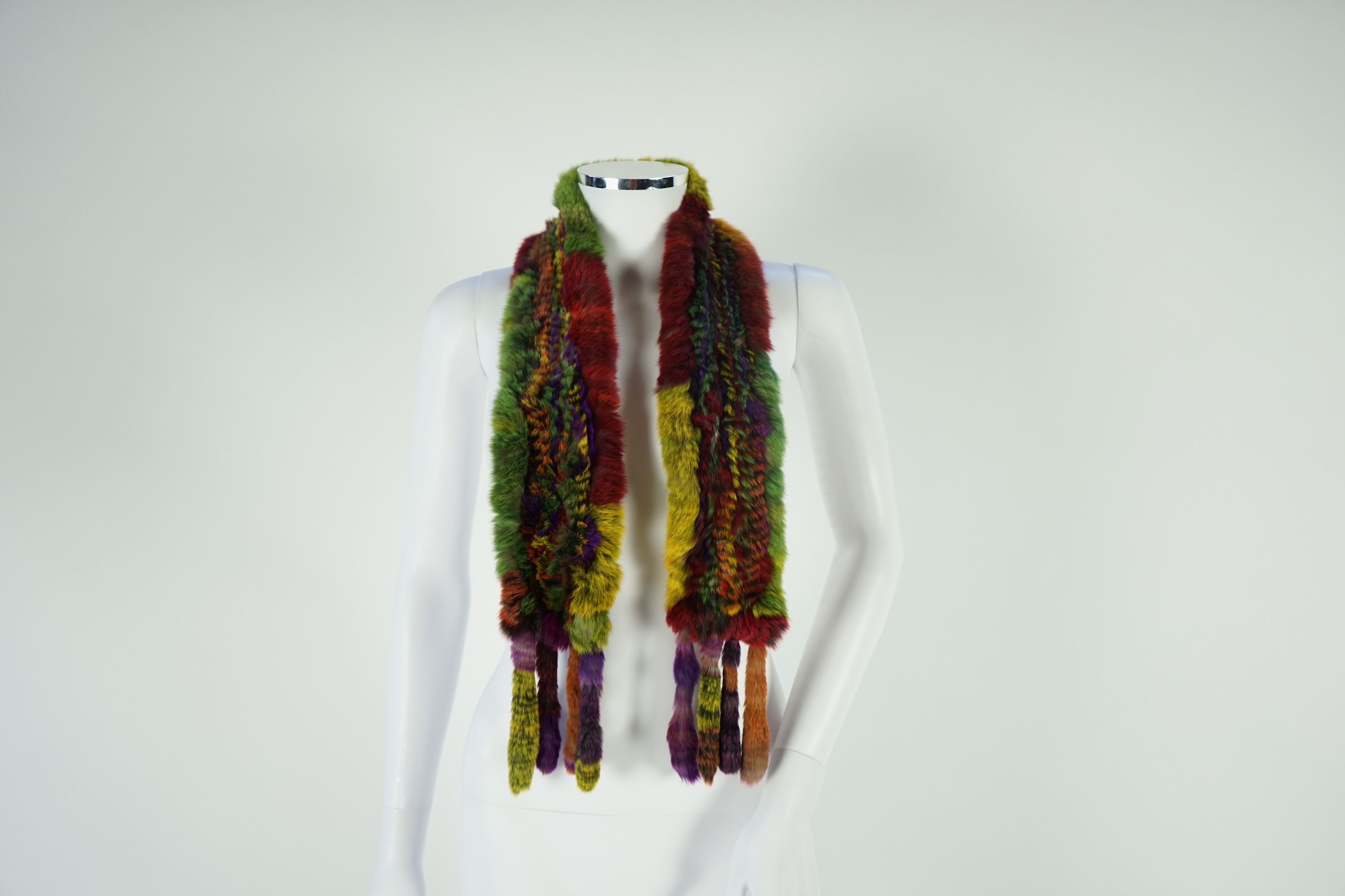 A selection of fur scarves and a fur gilet